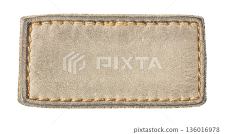 Blank brown leather tag with stitching on transparent background 136016978