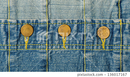 Blue denim fabric texture with brass button details Blue denim fabric texture with brass button details 136017167