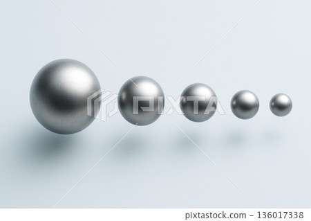A row of metal balls floating in space. Space for text. 136017338