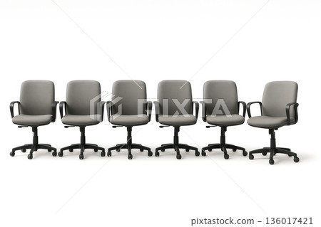 Six identical office chairs lined up in one row Space for text. Six identical office chairs lined up in one row Space for text. 136017421