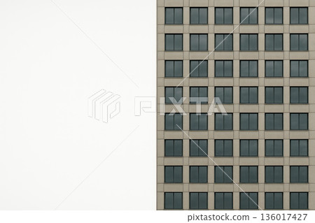 The facade of the building has rows of identical windows. Space for text. The facade of the building has rows of identical windows. Space for text. 136017427