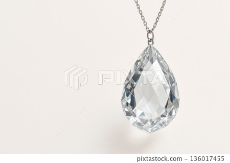 Teardrop-shaped pendant with a clear diamond. Space for text. 136017455