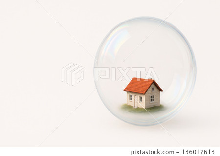 A small house inside a soap bubble. Space for text. A small house inside a soap bubble. Space for text. 136017613