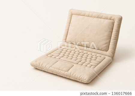 Soft laptop in the form of a pillow. Space for text. Soft laptop in the form of a pillow. Space for text. 136017666