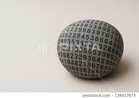 A sphere covered with many black numbers. Space for text. A sphere covered with many black numbers. Space for text. 136017673