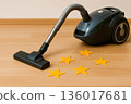 A vacuum cleaner picks up gold stars from the floor. 136017681