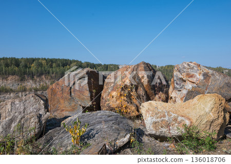 The production of graphite. Industrial background. Stone structure of the mineral. The production of graphite. Industrial background. Stone structure of the mineral. 136018706