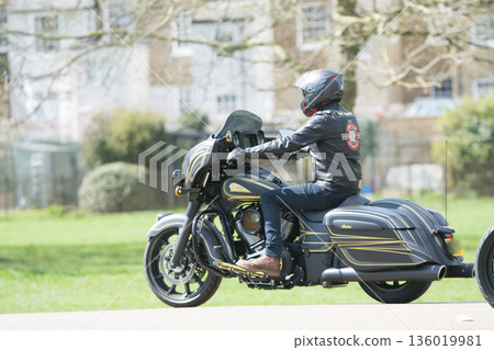 A group of large motorbikes on the Long Walk leading from Windsor Castle on the outskirts of London A group of large motorbikes on the Long Walk leading from Windsor Castle on the outskirts of London 136019981