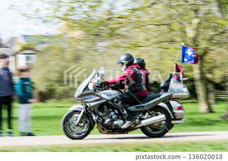 A group of large motorbikes on the Long Walk leading from Windsor Castle on the outskirts of London A group of large motorbikes on the Long Walk leading from Windsor Castle on the outskirts of London 136020018