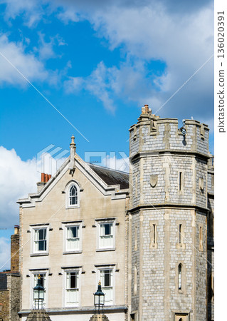 A historic stone building under bright sunlight in Windsor, a suburb of London A historic stone building under bright sunlight in Windsor, a suburb of London 136020391