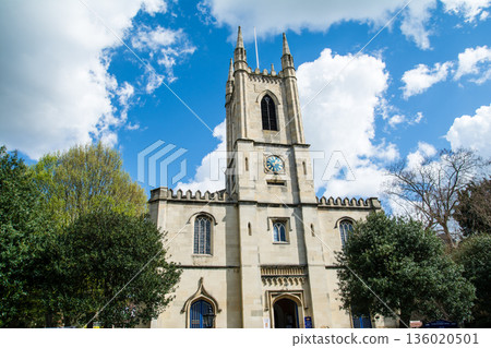 A historic stone church under bright sunlight in Windsor, a suburb of London 136020501