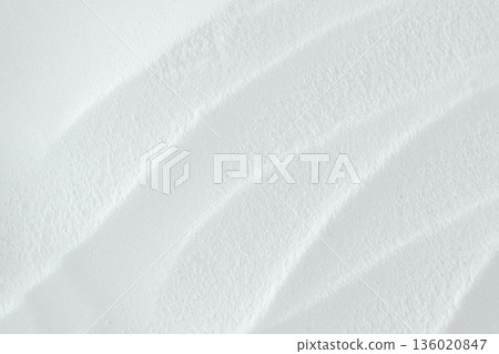 Soda powder sodium bicarbonate surface. Abstract white background. White texture with wavy patterns top view Soda powder sodium bicarbonate surface. Abstract white background. White texture with wavy patterns top view 136020847
