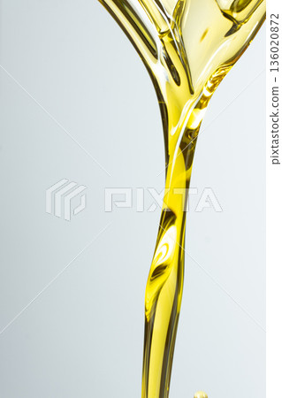 Vertical Abstract Background Flow Of Unrefined Oil, Space For Text, Macro Texture 136020872