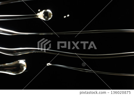Culinary Creativity with Flowing Sunflower Oil, Macro Texture 136020875