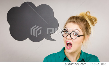 Confident rude business woman with thinking bubble 136021083