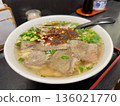 Lanzhou Beef Ramen with plenty of beef. Chinese noodles with the aroma of coriander and chili oil. 136021770