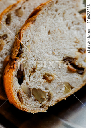 European-style longan and walnut bread slices by the window in the sunlight European-style longan and walnut bread slices by the window in the sunlight 136022388