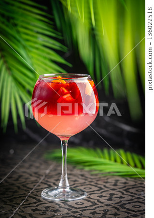 Glass of red wine spanish cocktail 136022518