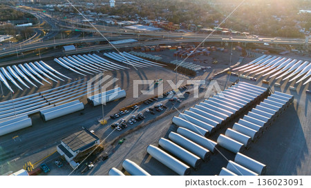 Aerial view of wind turbine blades storage at port logistics hub Aerial view of wind turbine blades storage at port logistics hub 136023091