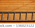 Wooden staircase hanging on wooden wall, background, copy space, rural scene 136023122