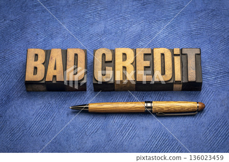 bad credit word abstract in wood type, financial concept 136023459