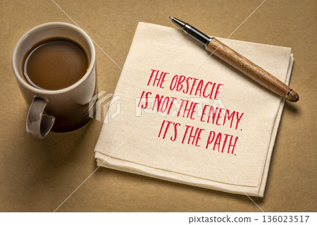 The obstacle is not the enemy. It's the path. Philosophical note on a napkin with coffee. The obstacle is not the enemy. It's the path. Philosophical note on a napkin with coffee. 136023517