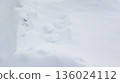 Winter snowy field background with undulating snow 136024112