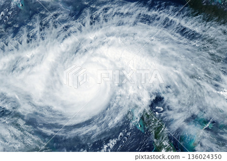 Hurricane from space. Atmospheric cyclone. Elements of this image furnished by NASA Hurricane from space. Atmospheric cyclone. Elements of this image furnished by NASA 136024350