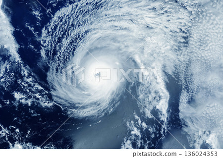 Hurricane from space. Atmospheric cyclone. Elements of this image furnished by NASA Hurricane from space. Atmospheric cyclone. Elements of this image furnished by NASA 136024353