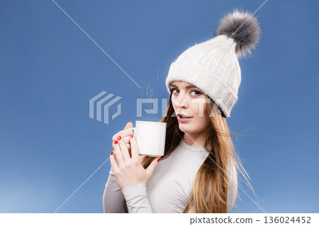 girl in thermal underwear drinking tea girl in thermal underwear drinking tea 136024452