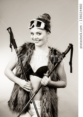 Winter season and lady with sticks. Winter season and lady with sticks. 136024460