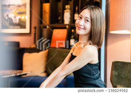 A woman with a mature pose A woman with a mature pose 136024562