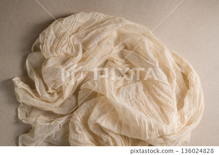 Ivory neutral cloth textile fabric template top view Ivory neutral cloth textile fabric template top view 136024828