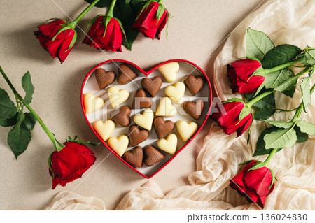 Valentine's Day background, heart gif box with heart chocolates and bouquet of red roses flowers. Mother's day concept 136024830
