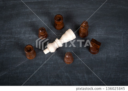 Leadership Collapse Concept With Fallen Chess King Surrounded By Pieces Leadership Collapse Concept With Fallen Chess King Surrounded By Pieces 136025845
