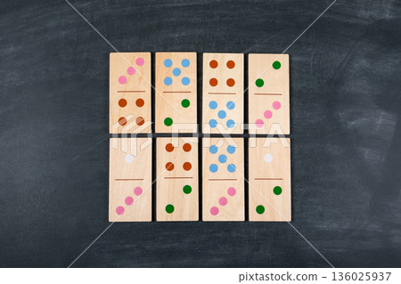 Wooden Domino Tiles Arranged In Grid Pattern On Dark Background Wooden Domino Tiles Arranged In Grid Pattern On Dark Background 136025937