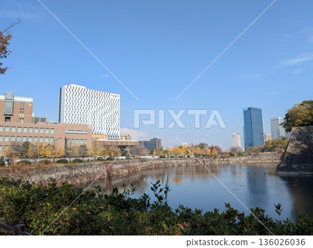 Buildings seen across the moat of Osaka Castle 136026036