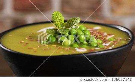 Green pea soup with seeds Green pea soup with seeds 136027148