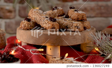 Cereal bars with almonds, coconut and cranberries 136027249