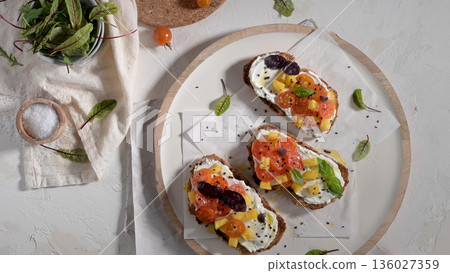 Italian bruschetta with roasted tomatoes Italian bruschetta with roasted tomatoes 136027359
