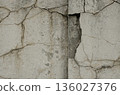 Damaged concrete steps outdoors showing cracks and holes 136027376