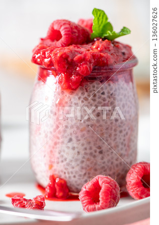 Closeup of a single raspberry chia pudding 136027626