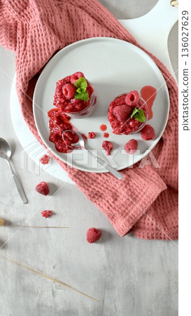 Chia seed pudding with fresh raspberry coulis Chia seed pudding with fresh raspberry coulis 136027629