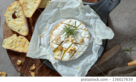 Fresh sliced Camembert cheese 136027639