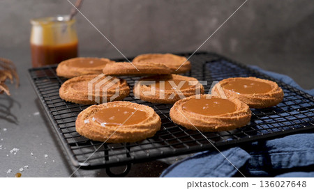 Biscuits with salted caramel Biscuits with salted caramel 136027648