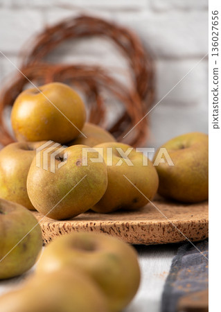 Cozy autumn scene with rustic apples Cozy autumn scene with rustic apples 136027656