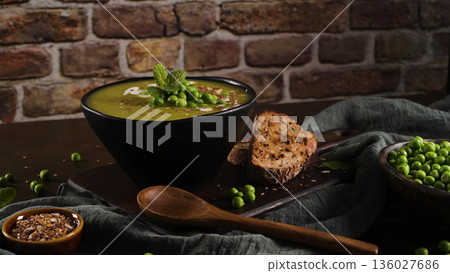 Green pea soup with seeds Green pea soup with seeds 136027686
