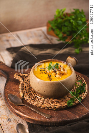 Creamy Pumpkin Soup with Roasted Chickpeas and Black Sesame Seeds Creamy Pumpkin Soup with Roasted Chickpeas and Black Sesame Seeds 136027712