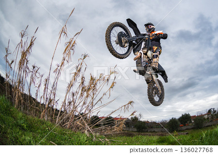 Enduro bike rider Enduro bike rider 136027768
