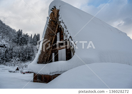 Snowy scenery of Ainokura Gassho-style village in Gokayama, Etchu 136028272